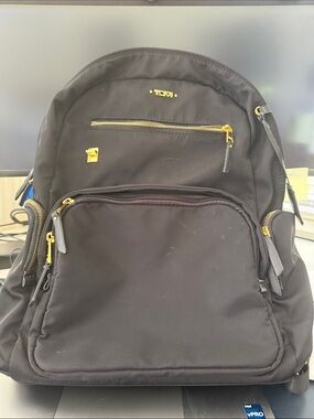 Tumi Black Backpack with Gold Hardware